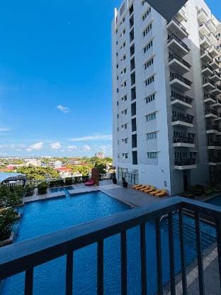 Tranquil Poolside Balcony Apartment in Iloilo City