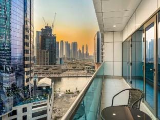 Luxury 2BR Near Burj Khalifa w/ Pool & Canal Views Vacation rental in Dubai
