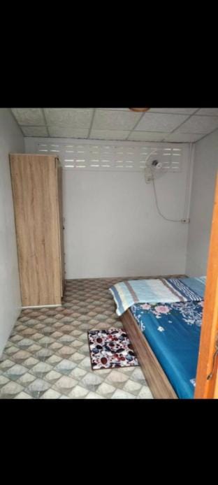 Economy double room with fan only and external bathroom facilities Apartment in Phe