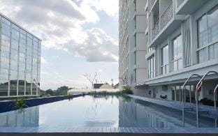 Warm Minimalist Studio Patraland Amarta ByTravelio Apartment in Special Region of Yogyakarta