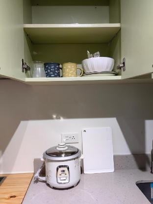 Big Kitchen + Work Area | Pool & WiFi Near IT Park Apartment in Lapu-Lapu City