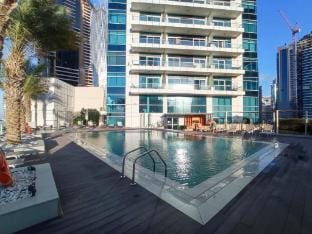 Sophisticated 1-Bedroom With Skyscrapers View at Botanica Tower Apartment in Dubai
