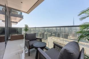 Bedroom in Nobles Tower with Burj Khalifa Views Apartment in Dubai