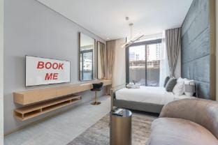 A Premium and Modern Studio in The Autograph  JVC Apartment in Dubai
