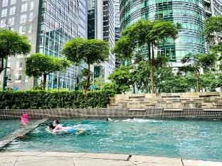 Huge 101-SQM Loft in Central BGC | Up to 12 Guests Apartment in Makati