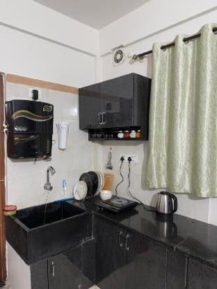 Janni’s Stays Studio Kitchen Perfect for Couples Vacation rental in Bengaluru