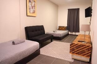 Garden Cabin Singlebeds #6 @ Bambü Getaway Vacation rental in Kedah
