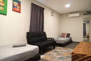 Garden Cabin Singlebeds #3 @ Bambü Getaway Vacation rental in Kedah