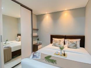 Homey Modern 2BR Patraland Urbano Apt By Travelio Apartment in West Java