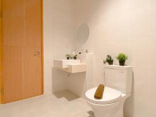 Modern Monochromatic 2BR Samara Suites By Travelio Apartment in South Jakarta City
