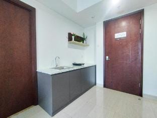 Simple 1BR Grand Sungkono Lagoon Apt By Travelio Apartment in Surabaya