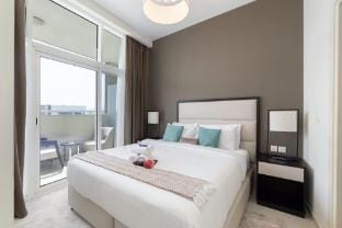 Modern 1 Bed in JVC Sleeps 4 with City Views Apartment in Dubai