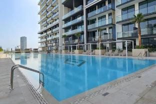 JVC Apartment Sleeps 4 with Pool View Apartment in Dubai