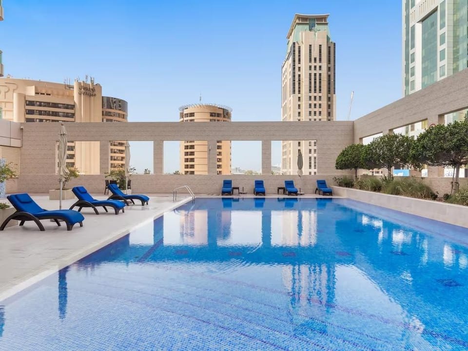 SettlerHomes - Royal Oceanic - Terrace Hotel in Dubai