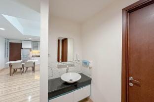 Near Mall 3BR at Grand Sungkono Lagoon By Travelio Apartment in Surabaya