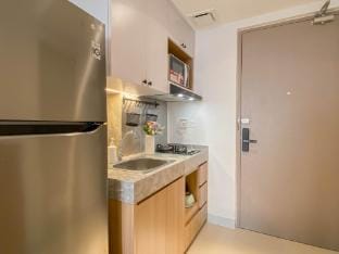 Modern Look 1BR at Vasanta Innopark By Travelio Apartment in West Java