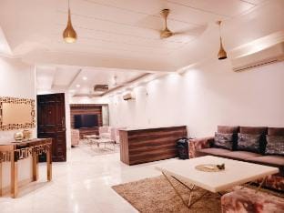 1 BHK- GK1 near M Block Market by HostMyStay Vacation rental in New Delhi