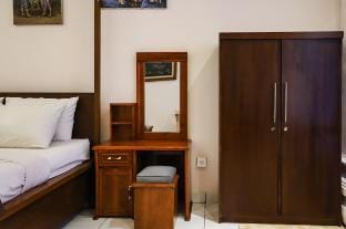 Simple Classic Room with Own Kitchen + Shared Pool Vacation rental in Marga