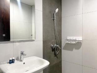 White Toned Studio at LRT City Bekasi By Travelio Apartment in West Java