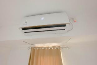 Simple White Accent Studio Paltrow City ByTravelio Apartment in Indonesia