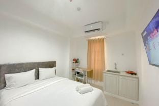 Simple White Accent Studio Paltrow City ByTravelio Apartment in Indonesia