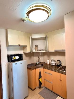 Airport Condo Stay in Pasay – Walk to NAIA T3 Apartment in Pasay