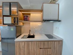 Cozy Functional Studio Vasanta Innopark ByTravelio Apartment in West Java