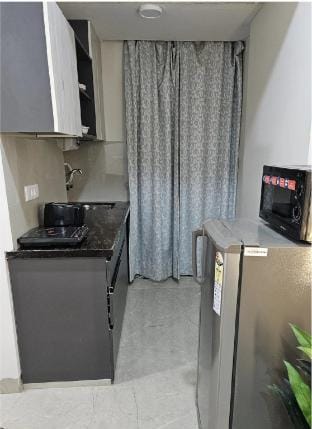 Modern Studio with Kitchenette & Cozy Seating Vacation rental in Jaipur