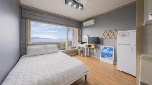 Love Is A Hill Leaning Against The Sunset Bed and Breakfast in South Korea
