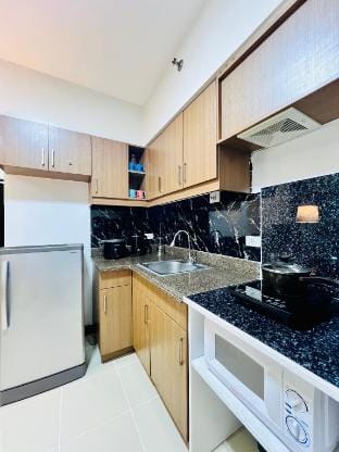 Rhapsody Residences Ps3 Netflix RecliningChair Apartment in Muntinlupa