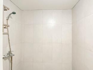 Soft Grey 1BR at Royal Sentul Park By Travelio Apartment in West Java