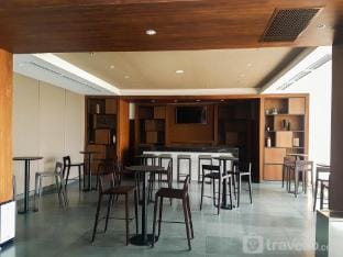 Monochrome Style 1BR at Branz BSD City By Travelio Apartment in West Java