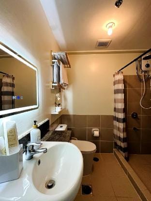 Cozy 1BR Staycation at Satori Residences Apartment in Pasig