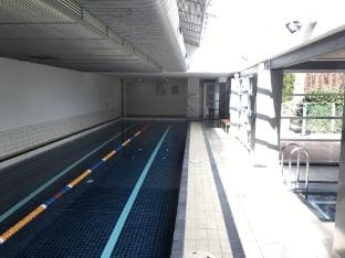 Unwind in Style at Melbournes Historic Art Deco Apartment with Pool Gym Carpark Apartment in Melbourne