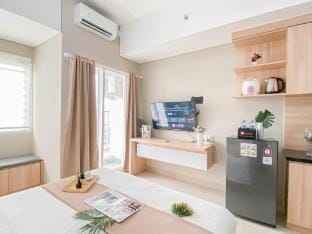 Soft Ivory Studio at Royal Sentul Park By Travelio Apartment in West Java
