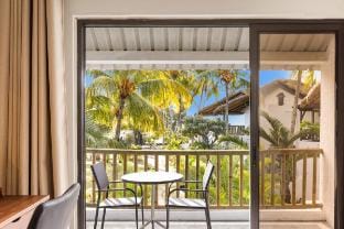 Grand Sahāna 18 | Beachfront Apartment w/ Balcony Vacation rental in Trou-aux-Biches