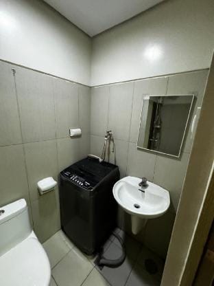 Breeze 1Br moa view Vacation rental in Pasay