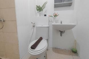 Brown Accent 1BR at Tamansari Prospero By Travelio Apartment in East Java