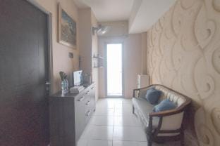 Brown Accent 1BR at Tamansari Prospero By Travelio Apartment in East Java