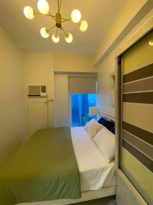 Cozy 2BR at The Currency Apartment in Pasig