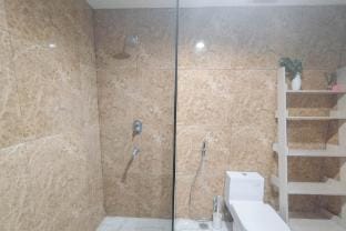 Near Mall 1BR at Grand Sungkono Lagoon By Travelio Apartment in Surabaya