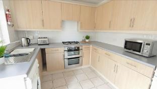 Charming 4-Bedroom Stoke Gifford Retreat for Up to 10 Guests Vacation rental in Bristol