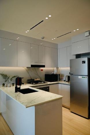 Luxury 1BH at JVC | Access to JBR & DXB Hills Mall Vacation rental in Dubai