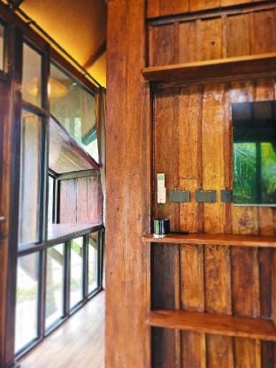 Cheewatra Farmstay Coconut House 1 Vacation rental in Thep Krasatti
