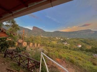 Modern Mud House with Mountain Views |Kanav Living Vacation rental in Kerala