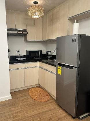 Homey Studio Unit behind Abreeza Mall with Parking Vacation rental in Davao City