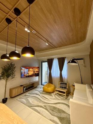 Scandi-Modern 1BR Condo @ Manhattan Plaza Tower 2 Vacation rental in Quezon City