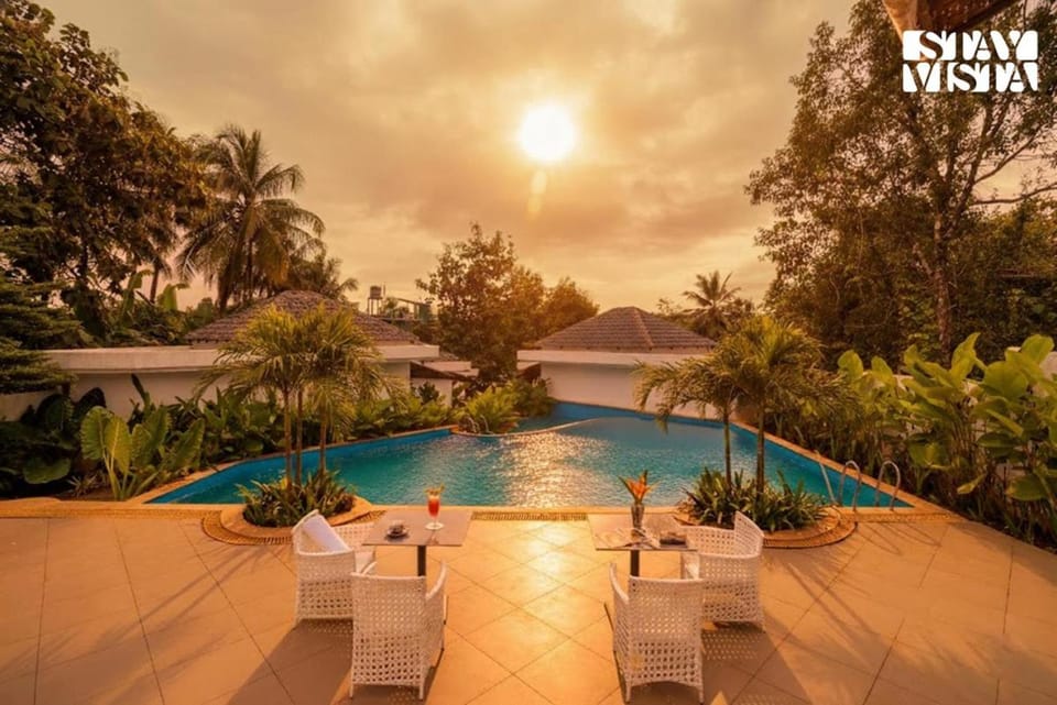 StayVista at Kuhu Natures Resort with BBQ, Pool Resort in Mandrem