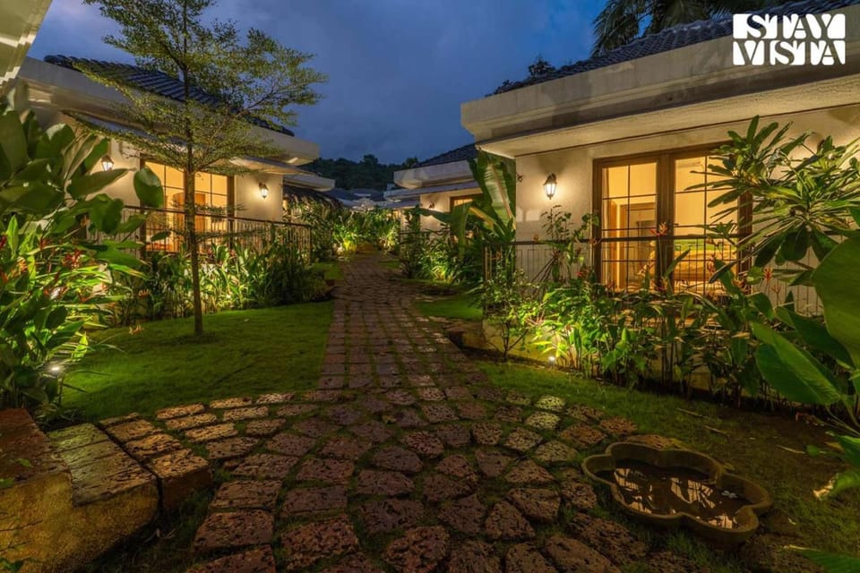 StayVista at Kuhu Natures Resort with BBQ, Pool Resort in Mandrem
