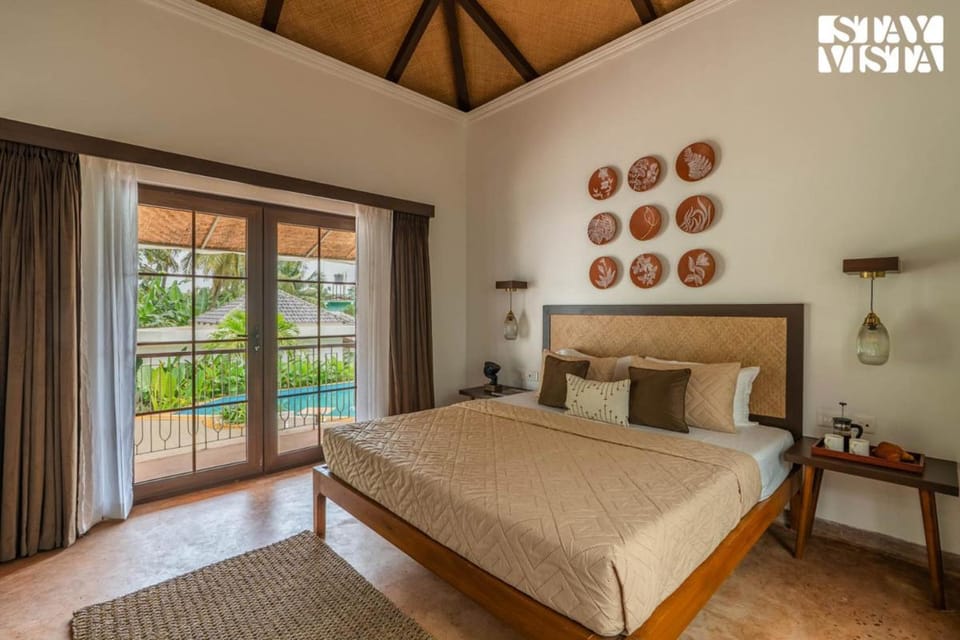 StayVista at Kuhu Natures Resort with BBQ, Pool Resort in Mandrem
